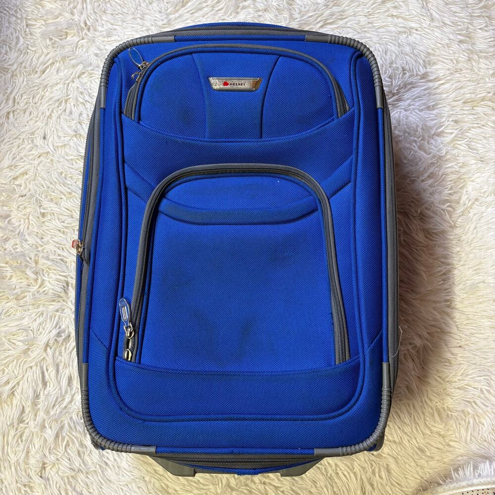 Delsey 26" 2 wheeled expandable blue luggage